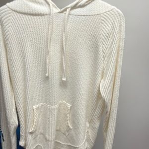 White thin waffle knit hoodie. It’s like a sweater with a hood